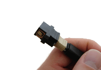 Hand Holding an MTP Cable and Connector